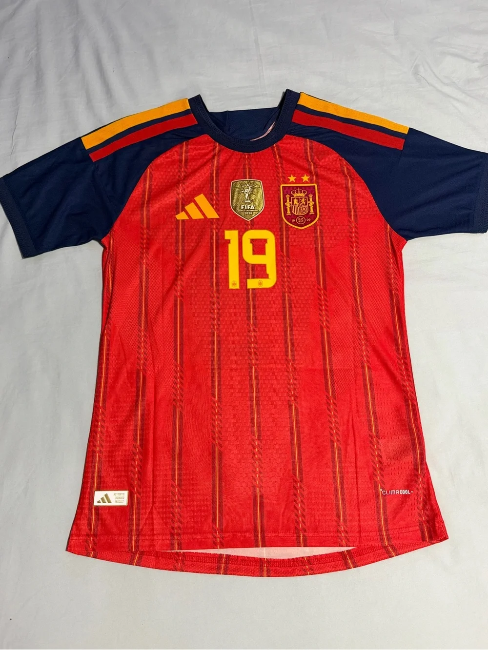 adidas Red Spain Soccer Jersey with Navy Sleeves & Yellow Accents